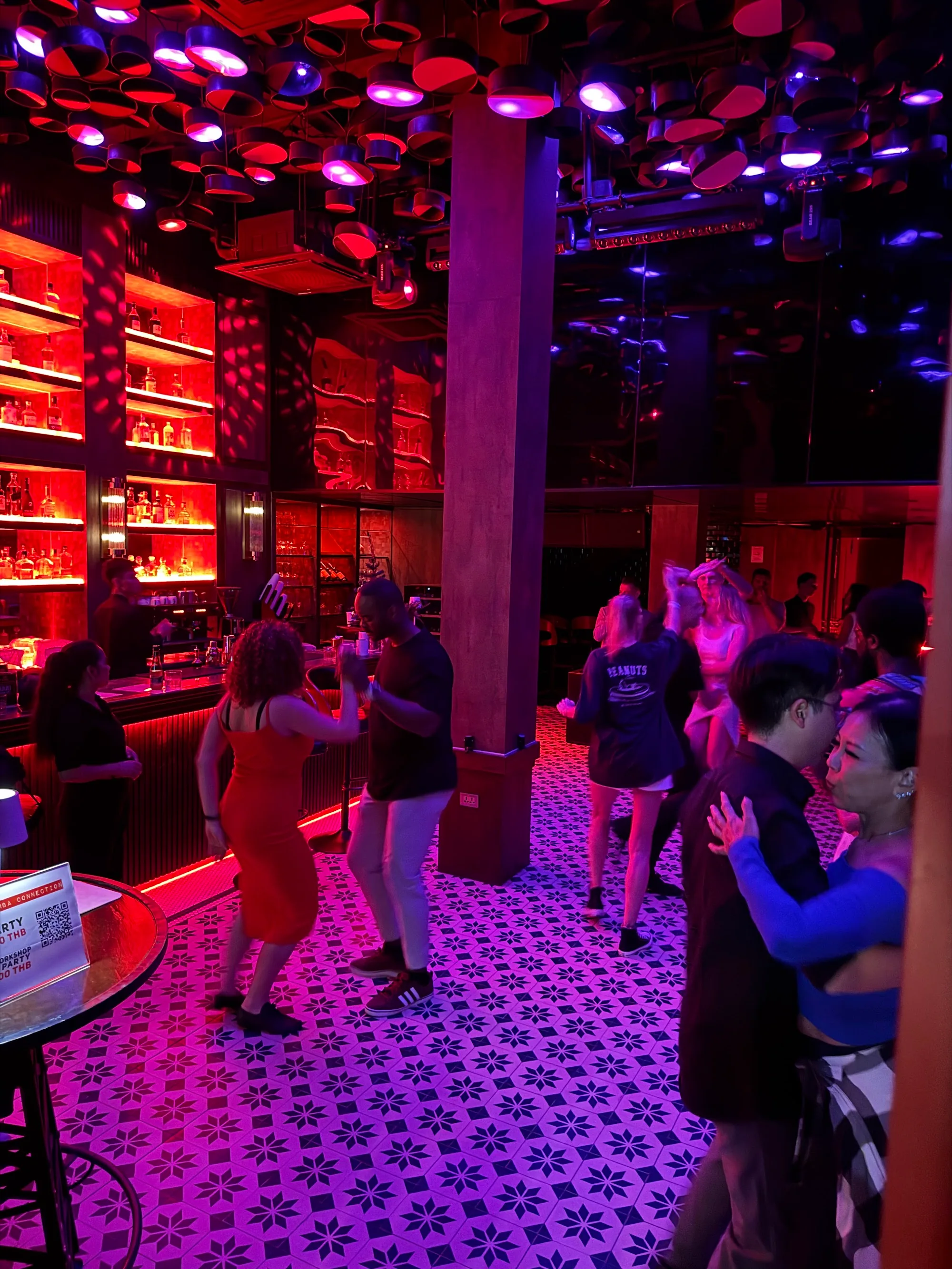 Dancers on the patterned dance floor at Saint of Salt Sukhumvit, Bangkok — salsa, bachata, kizomba venue in Bangkok