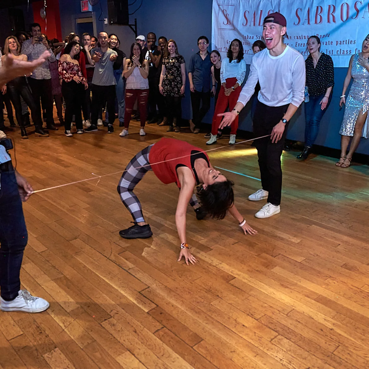 Salsa social dance moment with crowd at Little Dreams Event Space in New York