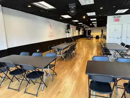 Event hall with wooden dance floor and disco ball at Little Dreams Event Space in New York — kizomba venue in New York