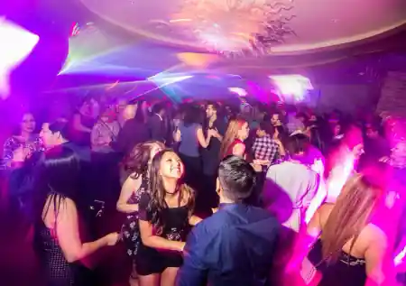 Couples dancing salsa at Gloria's Nightlife at The Domain Austin