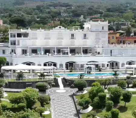 Aerial view of white Zeno Complex venue with pool and gardens in Ercolano Italy, salsa venue in Ercolano