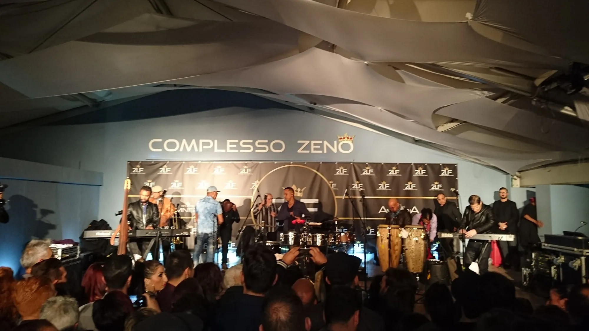 Live stage performance with crowd at Complesso Zeno Ercolano event venue