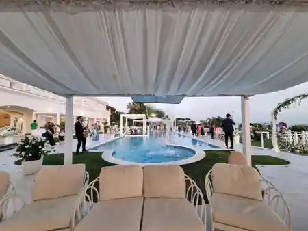 Outdoor poolside event space with guests at Zeno Complex Ercolano Italy, salsa venue in Ercolano