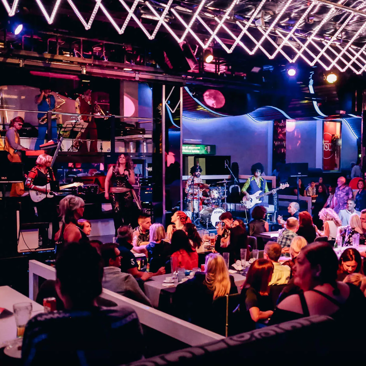 Live band performing in club lounge area at Discoteca Dorian Gray Verona