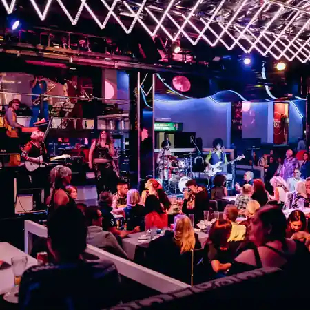 Live band performing in club lounge area at Discoteca Dorian Gray Verona — salsa, bachata, kizomba venue in Verona
