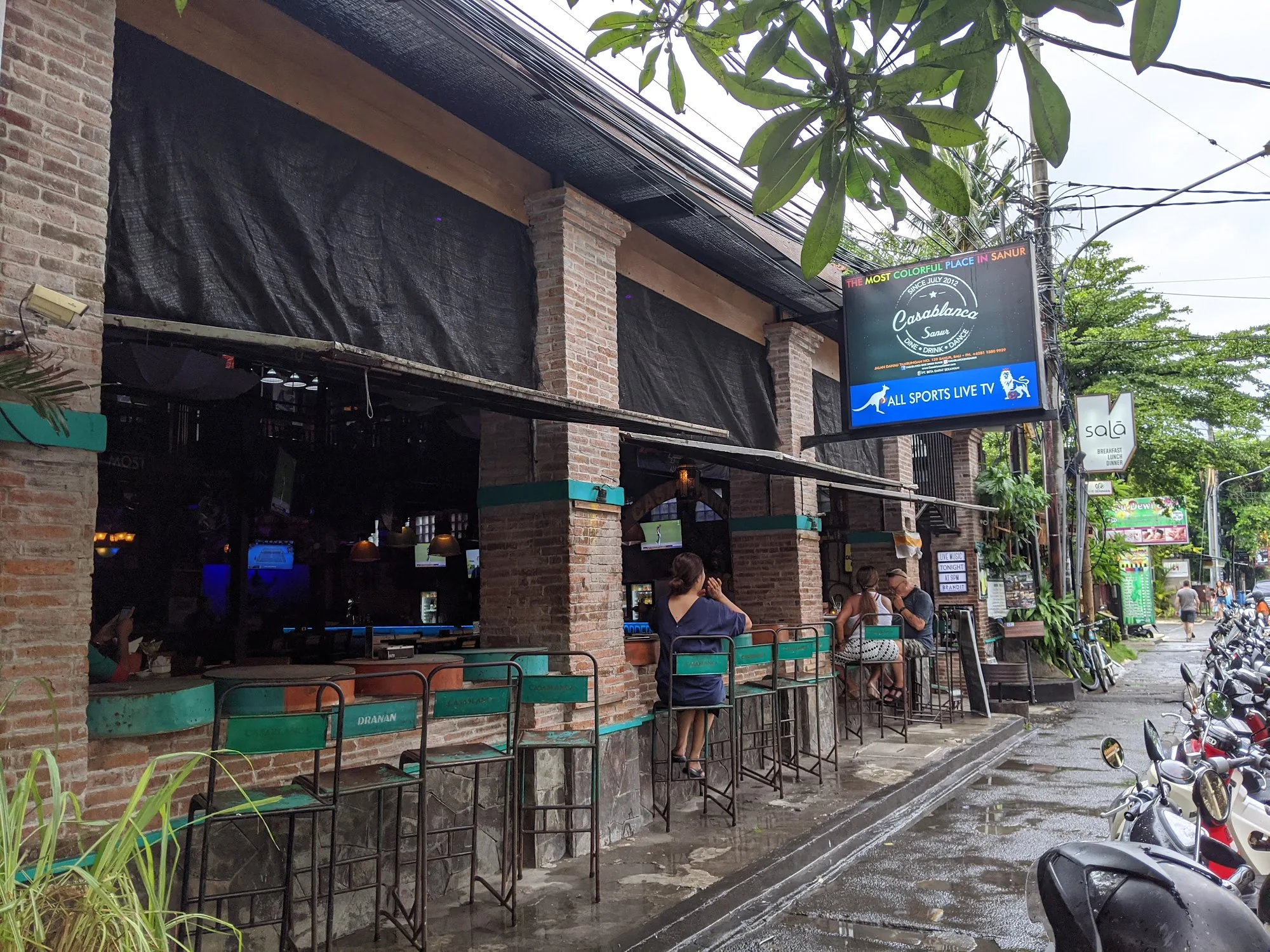 Exterior of Bakfickan Bar (Casablanca) in Sanur, Bali with branded signage and street-side seating