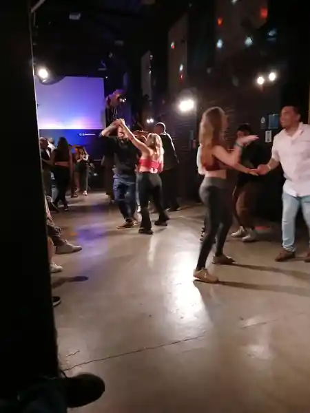 Packed social dance floor with couples dancing at Dancefree Medellin, salsa, bachata venue in Medellin