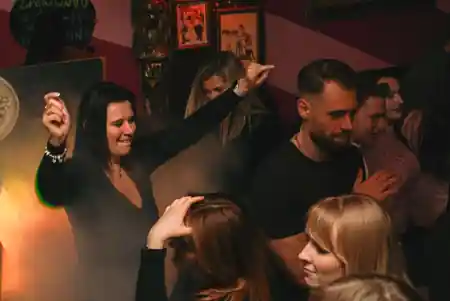 Guests dancing at a salsa social night at Czarny Kot Klub Wroclaw