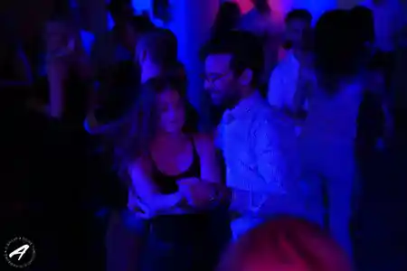 Couple dancing Bachata in close hold at A Bailar dance studio, Hamburg