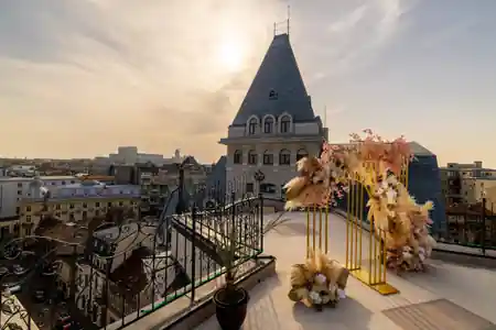 Rooftop terrace at Mille 18 Events with sunset view over historic Bucharest — salsa, bachata, kizomba venue in Bucharest