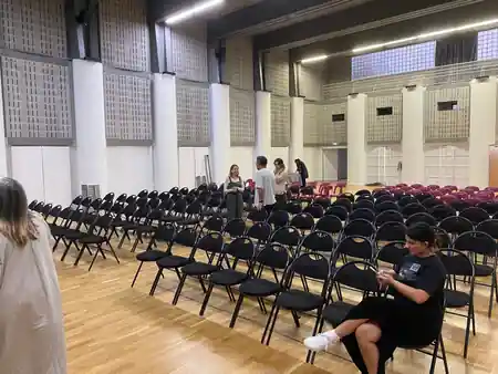 Paris Épicentre main hall with wood floor and event seating — bachata venue in Paris