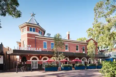 The Leederville Hotel exterior — a classic red-brick building with star atop the turret and outdoor seating — salsa, bachata, kizomba venue in Perth
