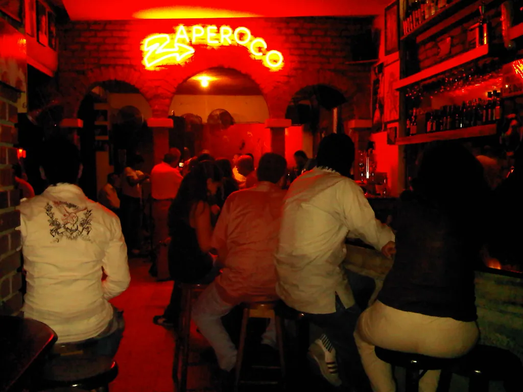Zaperoco salsa bar interior with red neon lighting in Cali, Colombia