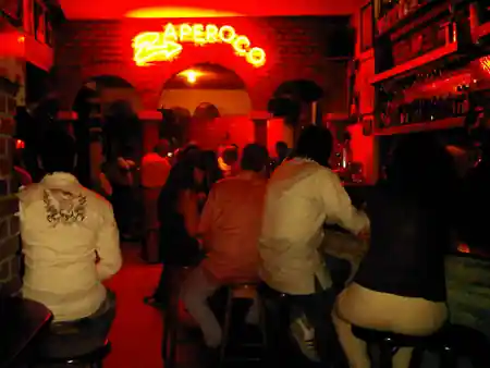 Zaperoco salsa bar interior with red neon lighting in Cali, Colombia