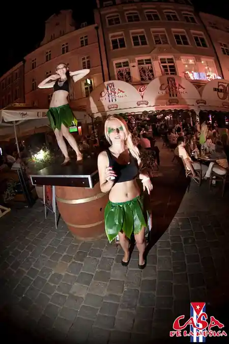 Exterior terrace of Casa de la Musica on Wroclaw market square at night — salsa, bachata venue in Wroclaw