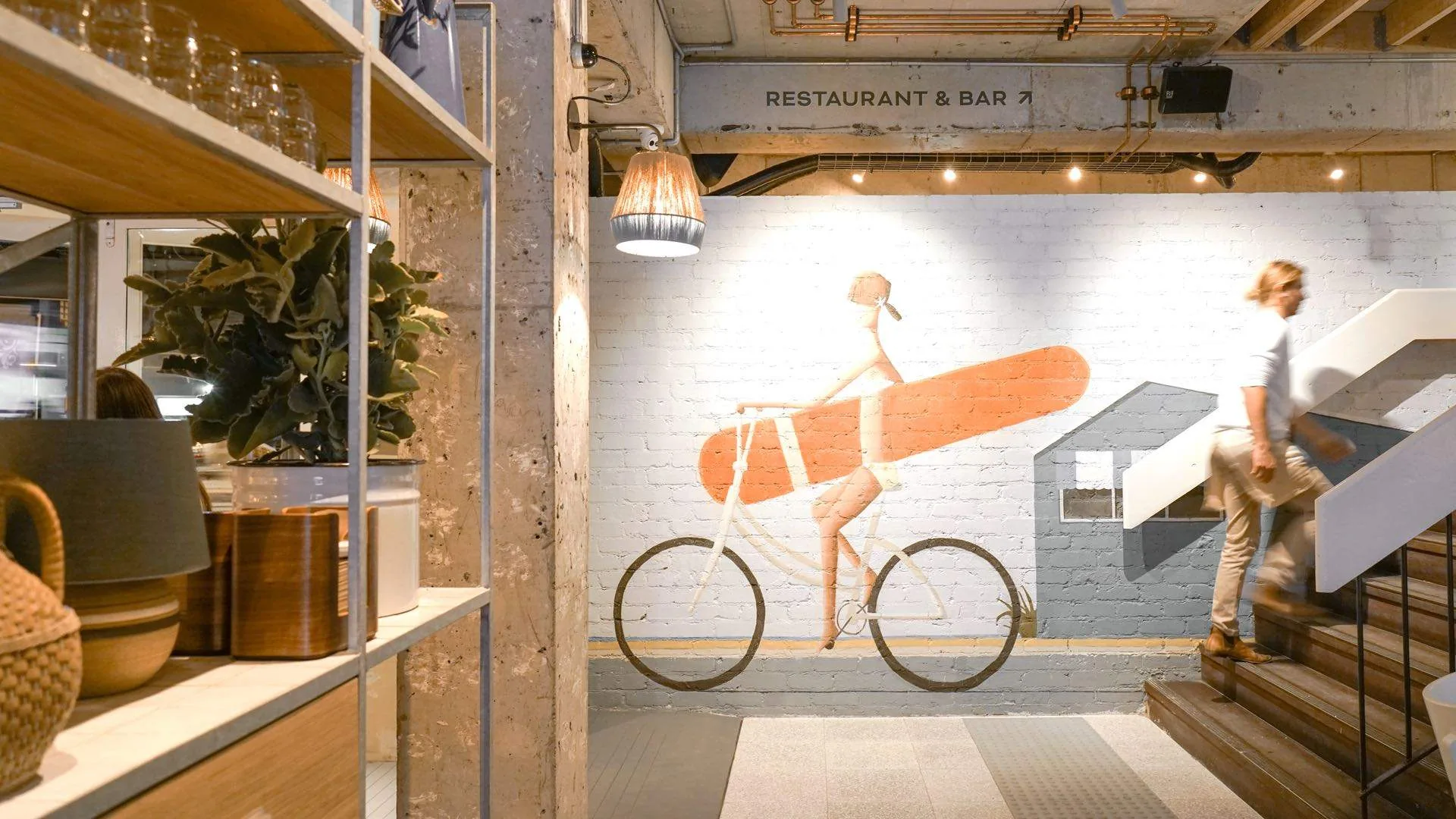 The Collaroy entrance with surfer wall mural and staircase, Sydney Northern Beaches