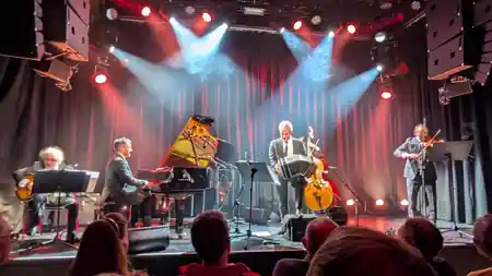 Live jazz band performing on stage at Moods Zurich with stage lighting — bachata, salsa venue in Zurich