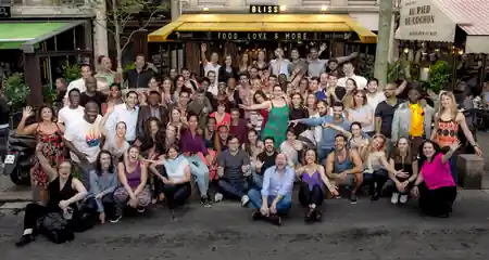 Mambo Salsa community group photo outside the venue in Paris