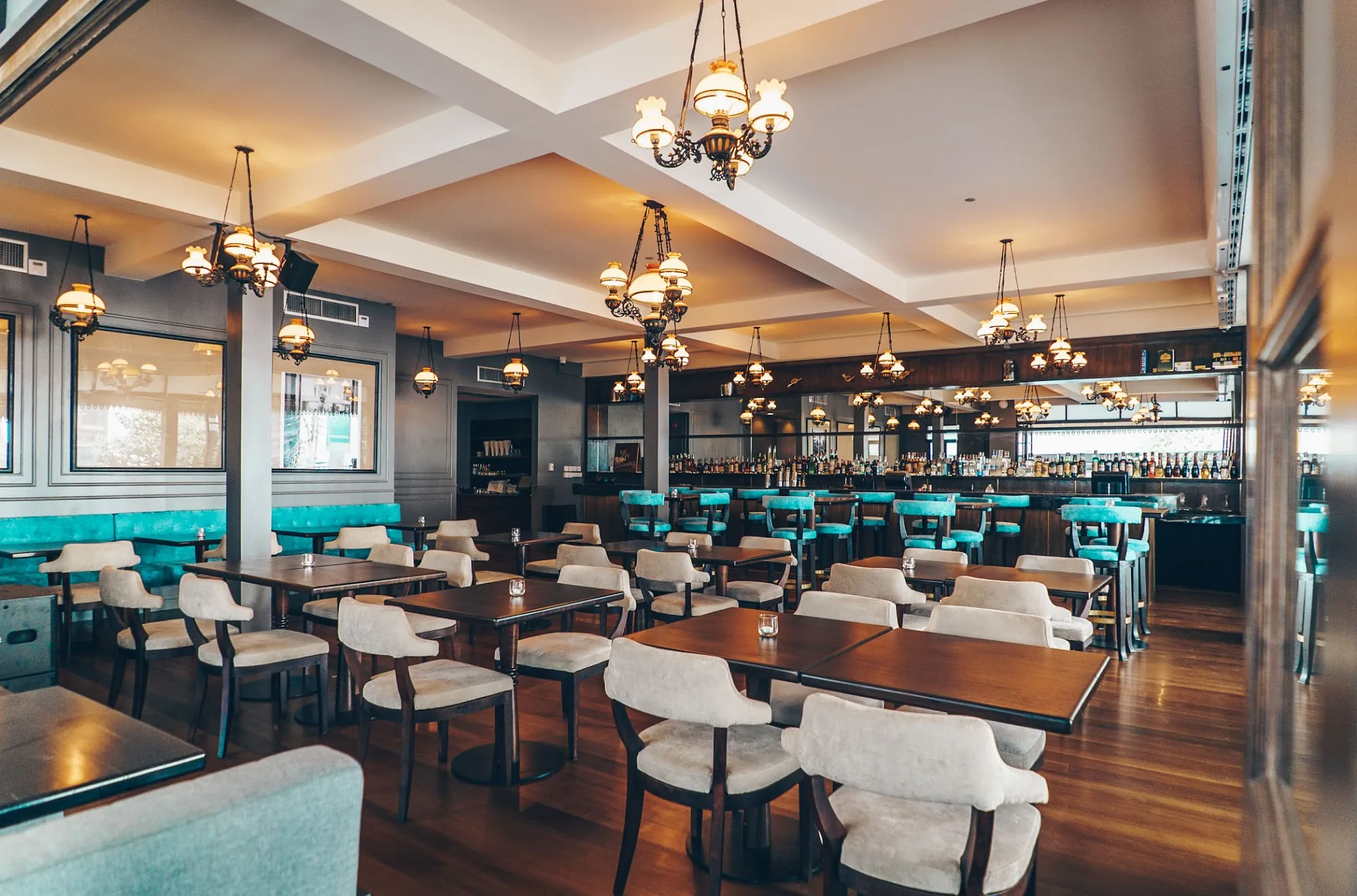 Elegant wood-panelled dining and bar area at Hemingways Bangkok restaurant and dance venue