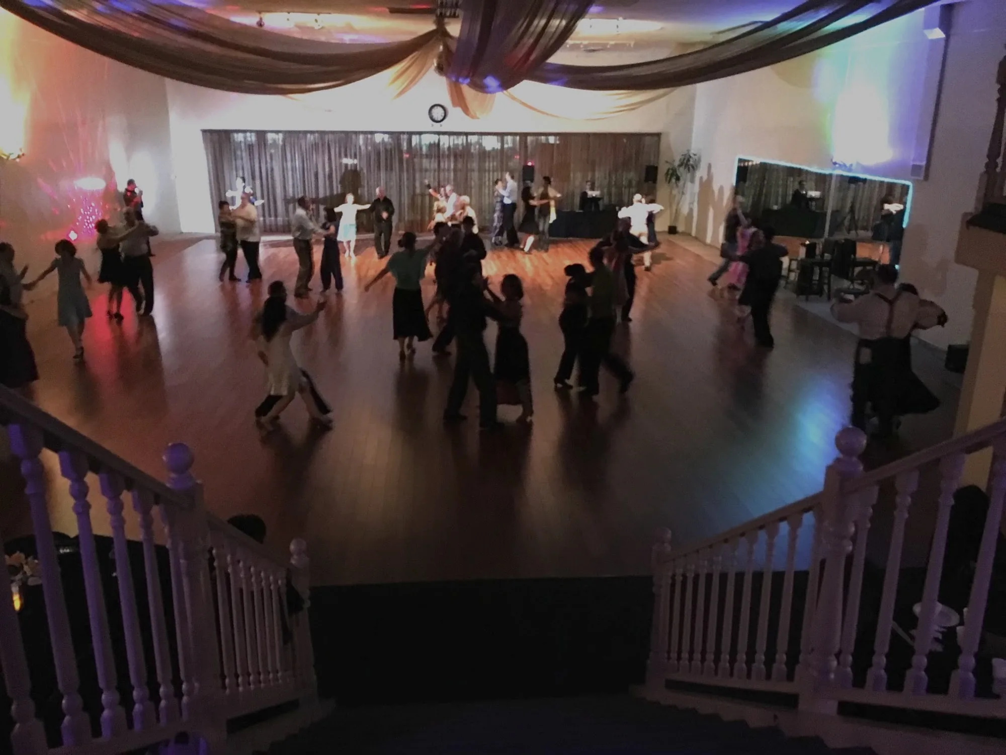 Evening social dance event with stage lighting at Hollywood Academy of Dance LA