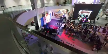 Live performance event in The Source OC mall atrium with stage and crowd in Buena Park — zouk venue in Buena Park