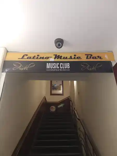 Entrance sign reading Latino Music Bar and cocktail bar & dance club at La Macumba — salsa, bachata, kizomba, zouk venue in Prague