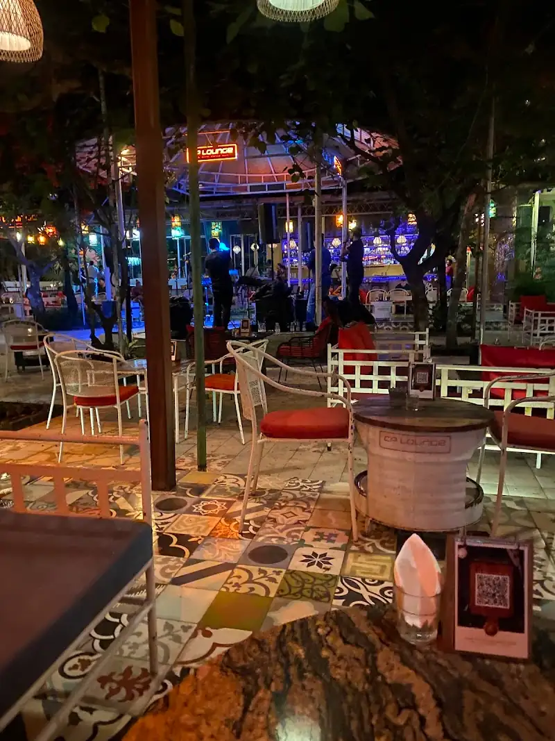 CP Lounge Bali outdoor entertainment venue at night with illuminated stage, live performers, and guests enjoying the dance night