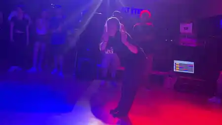Dancer performing on the dance floor with crowd watching at Kult Studio Munich — bachata venue in Munich