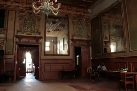 Historic Spiegelsaal (mirror hall) interior at Cl\u00e4rchens Ballhaus in Berlin with ornate chandeliers and mirrors — salsa venue in Berlin