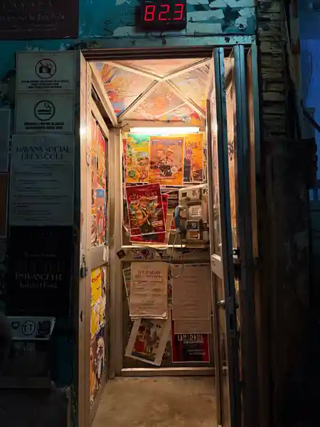 Entrance hallway with posters and dress code signs at Havana Social Bangkok — salsa, bachata venue in Bangkok