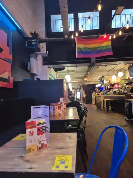 Wigwam Dublin bar interior with rainbow pride flag and neon lighting — salsa, bachata, kizomba venue in Dublin