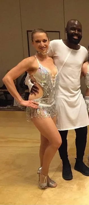 Atomic Ballroom salsa dance team performing on the ballroom floor