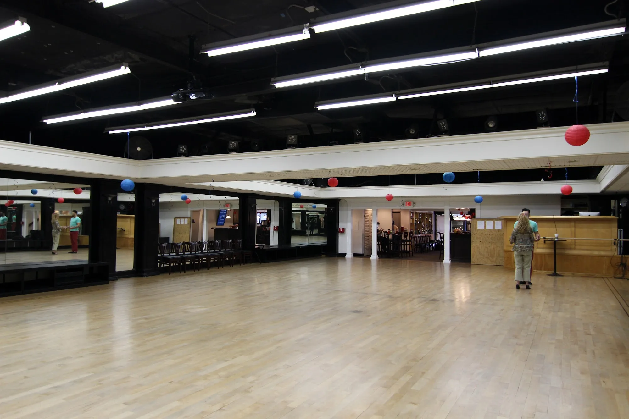 Large ballroom with mirrored walls and sprung dance floor at Atomic Ballroom, Irvine