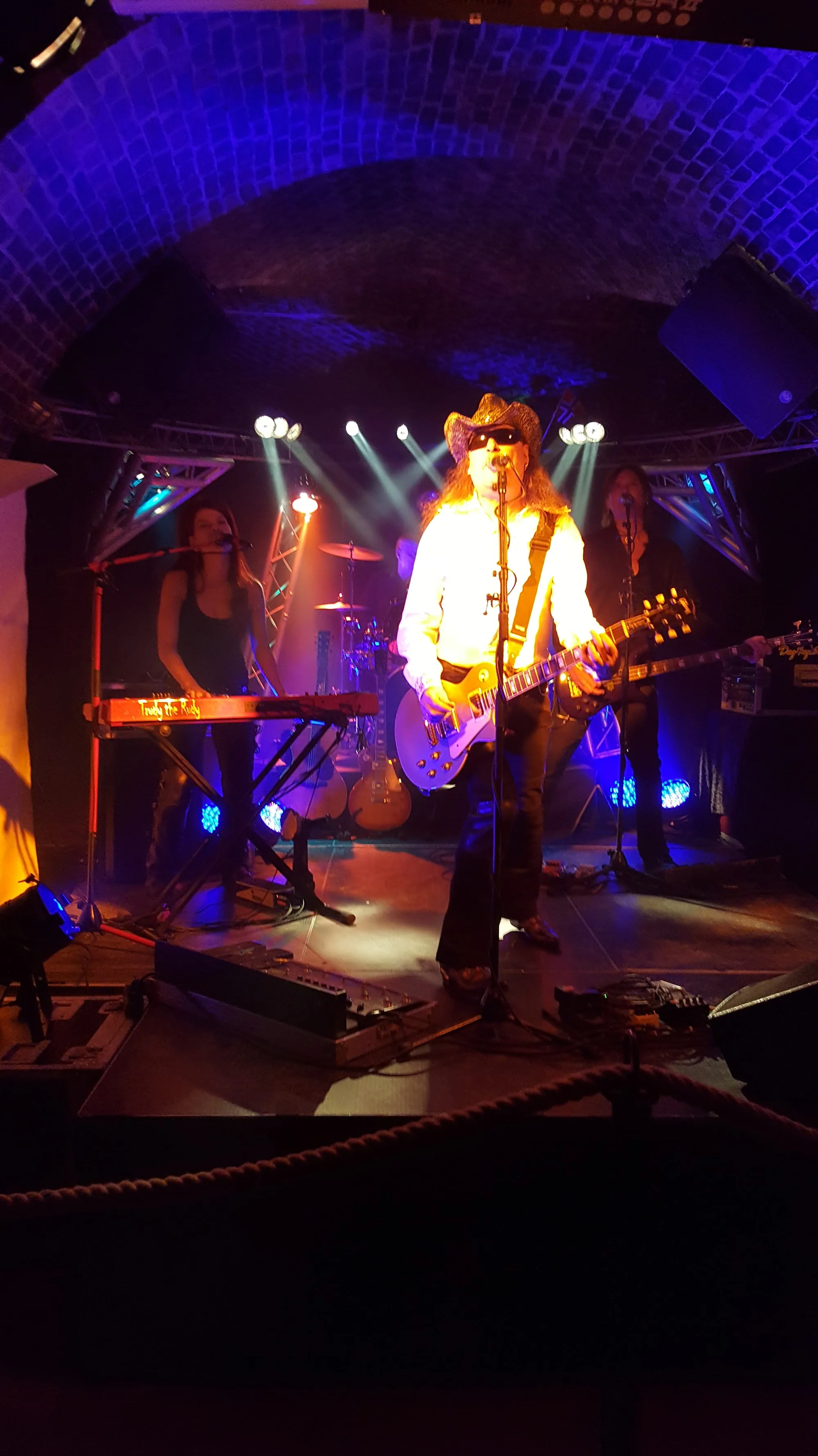 Live band performing on stage inside the stone arch cellar at ME Nightclub Trondheim