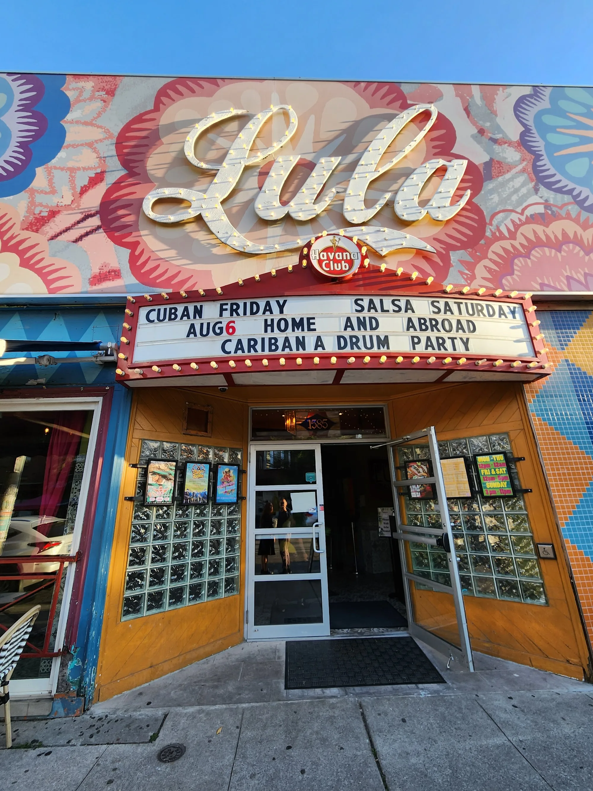 Lula Lounge Toronto entrance at night with Salsa Saturday neon exterior signage