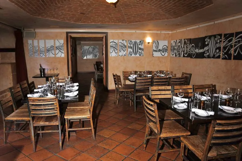 Atmospheric brick-vaulted interior dining room at Cigar Bar & Grill in San Francisco