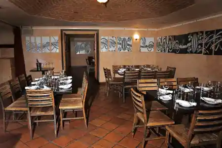 Atmospheric brick-vaulted interior dining room at Cigar Bar & Grill in San Francisco — salsa, bachata venue in San Francisco