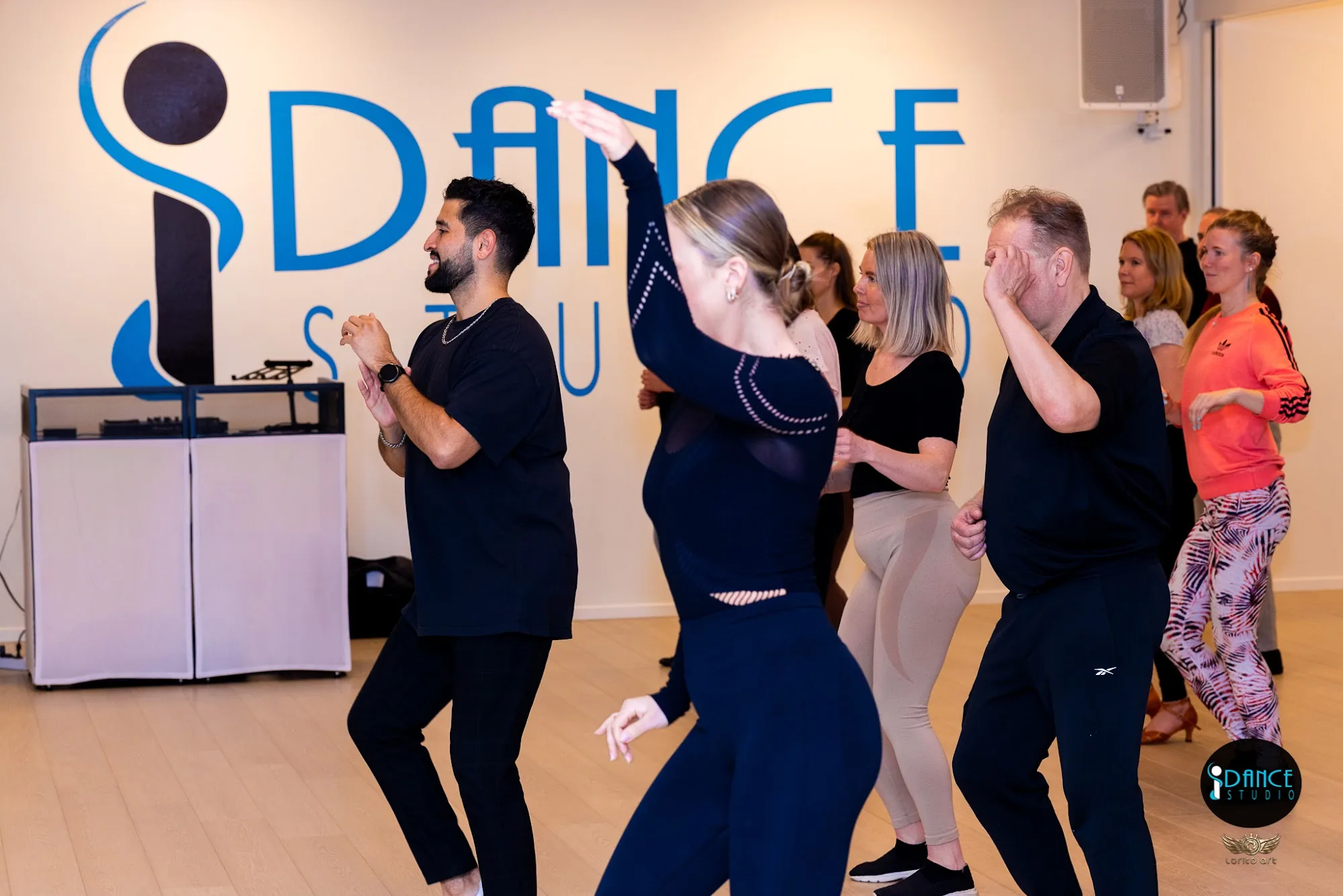 Couples dancing salsa at iDance Studio Söder in Stockholm Sweden