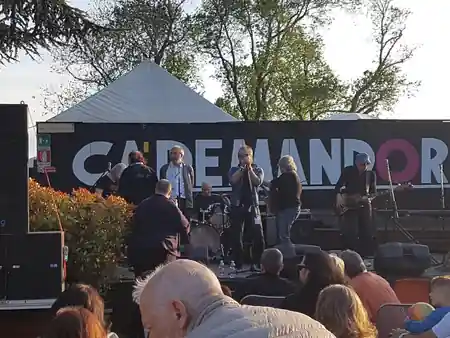 Live band performing on outdoor stage at Ristorante Ca de Mandorli San Lazzaro — salsa, bachata venue in San Lazzaro di Savena