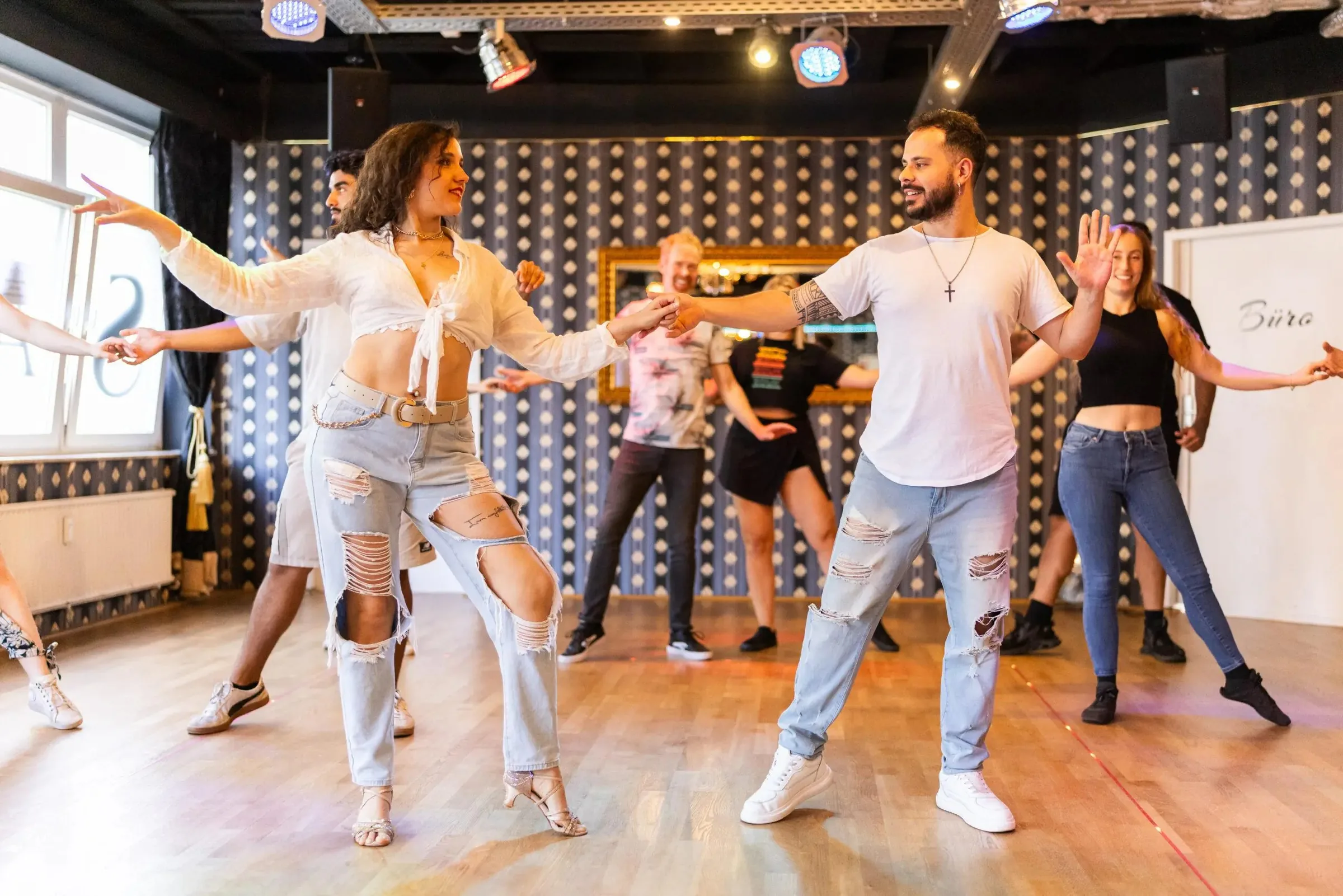 Dancers at a salsa and bachata social on the SalsArena floor in central Bremen