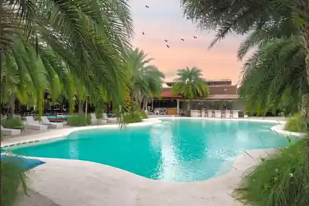 Signature pool and bar at sunset at CP Lounge Ubud, Bali — zouk venue in Bali