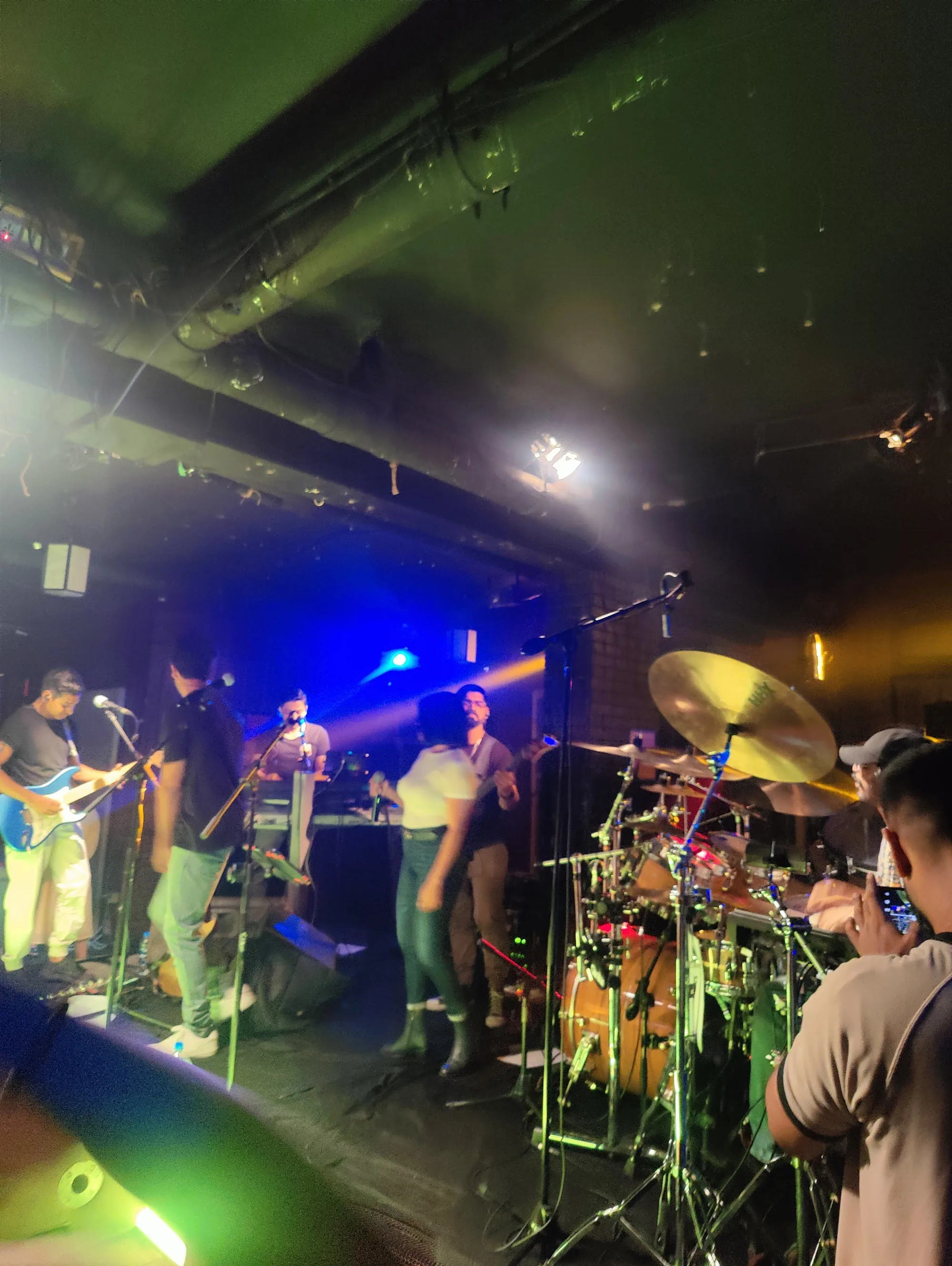 Live band performing on stage at Club 432 Zamzama Karachi nightclub
