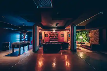 Club lounge area with leather sofas and dance floor at Hans im Club Dresden — salsa, bachata, kizomba venue in Dresden