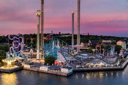 Aerial view of Gröna Lund amusement park and event venue in Stockholm at sunset — salsa, bachata venue in Stockholm