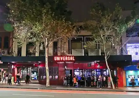 Universal Sydney nightclub exterior at night on Oxford Street, Darlinghurst — salsa, bachata venue in Sydney