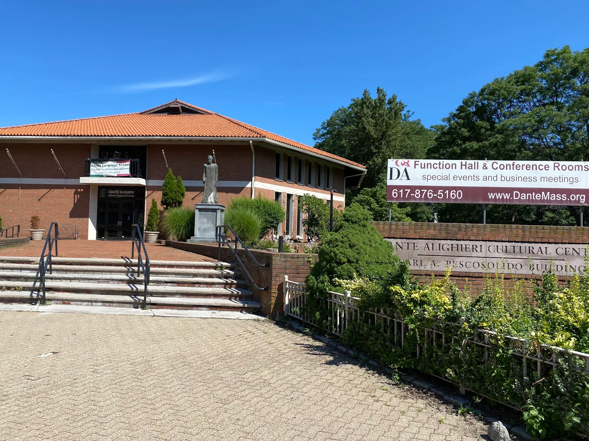 Brick exterior and entrance sign of the Dante Alighieri Cultural Center, Cambridge