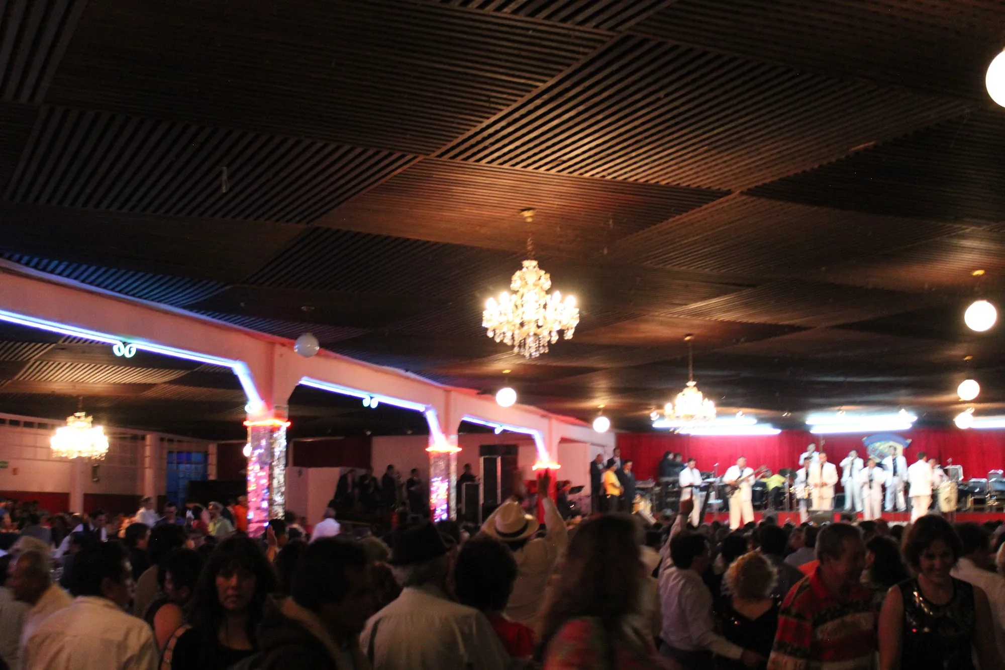 Packed dance hall with live orchestra at Salón Los Ángeles Mexico City iconic ballroom