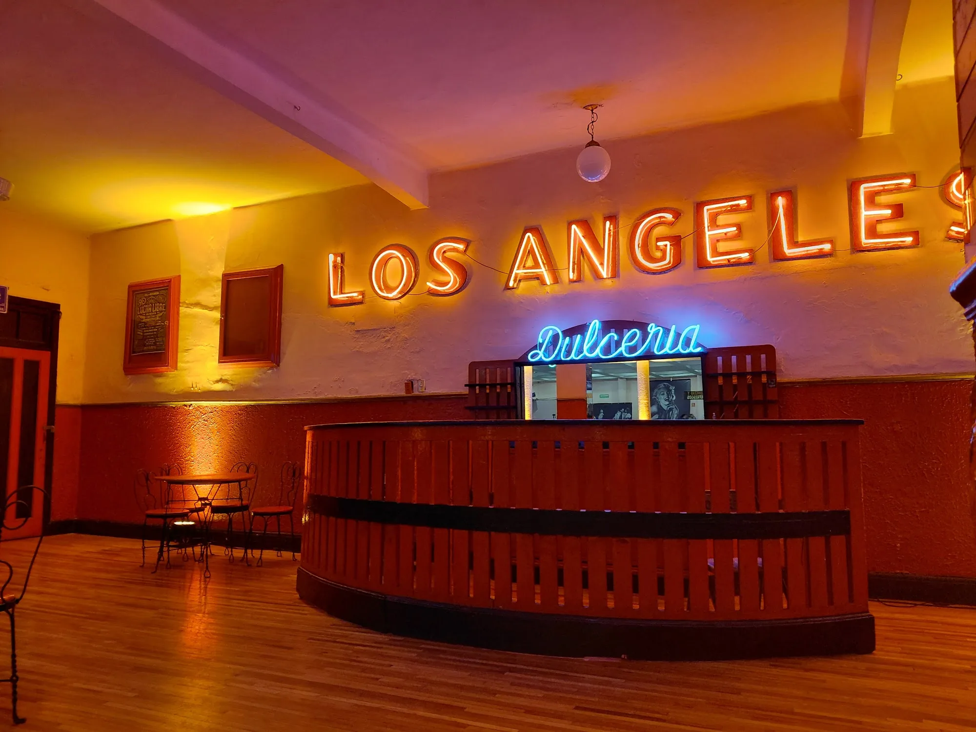 Los Angeles neon sign above bar counter at Salón Los Ángeles Mexico City