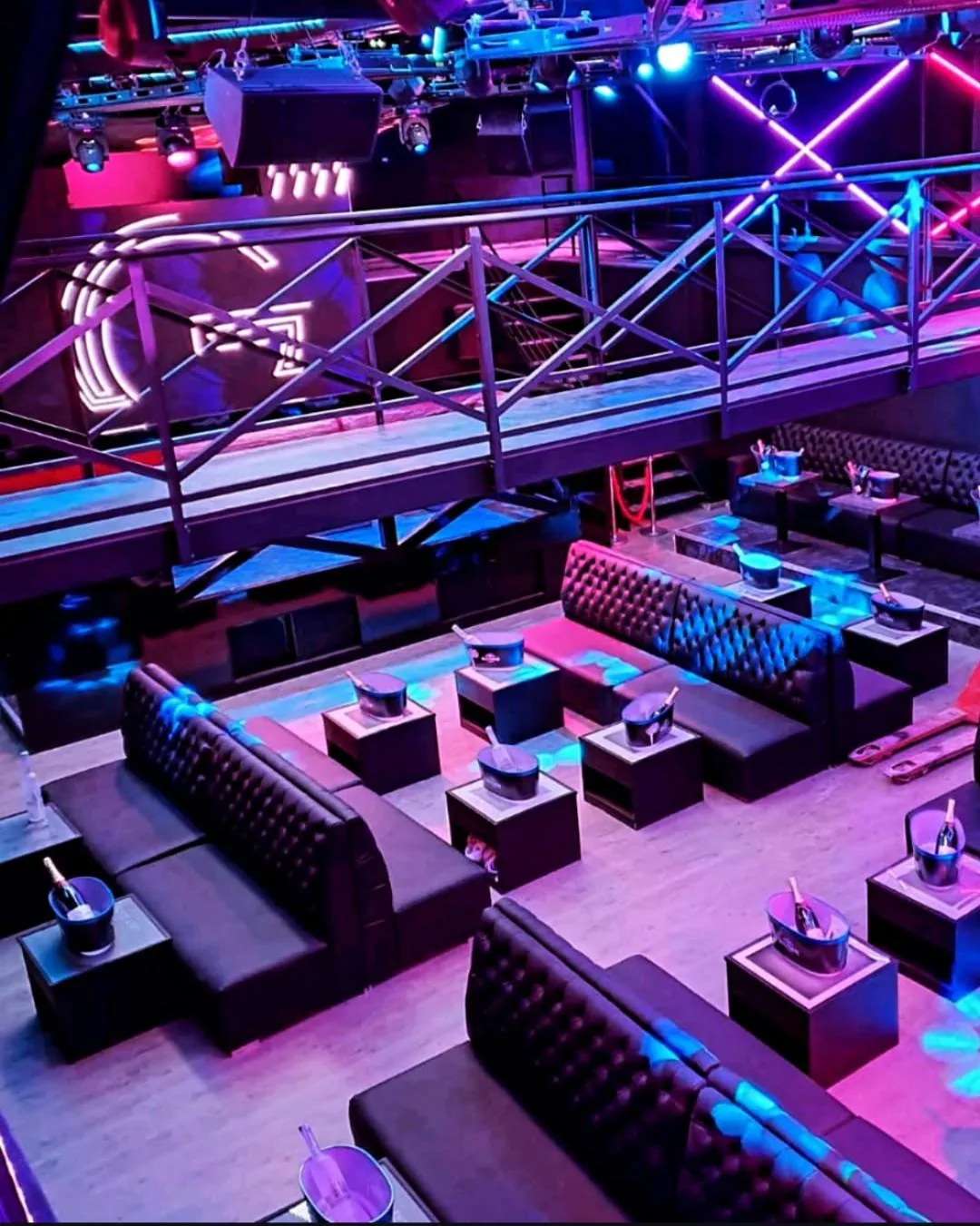 Neon lit nightclub interior with lounge seating at G Club, Paris — kizomba venue in Paris