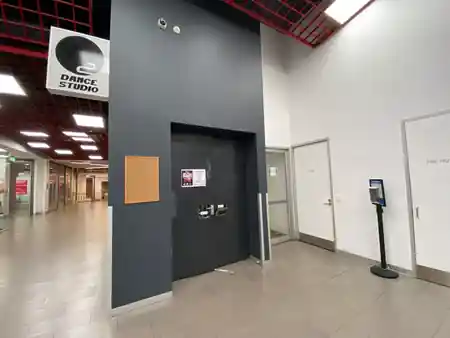 Dance IM studio entrance with branded signage providing wayfinding for Melbourne dancers — zouk venue in Melbourne